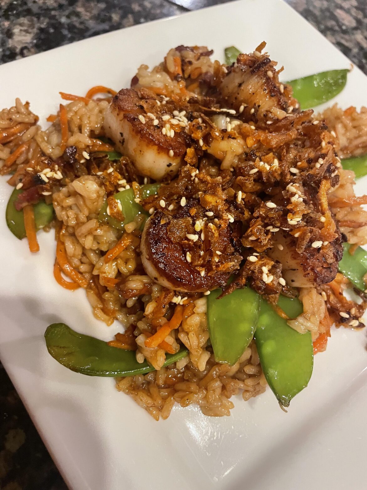 Homemade Ginger Chili Crisp and scallops.