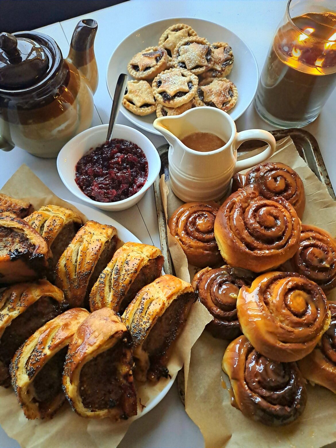 Stormy day so I made stuffing and cranberry sausage rolls, cinnamon buns with a caramel drizzle and mice pies