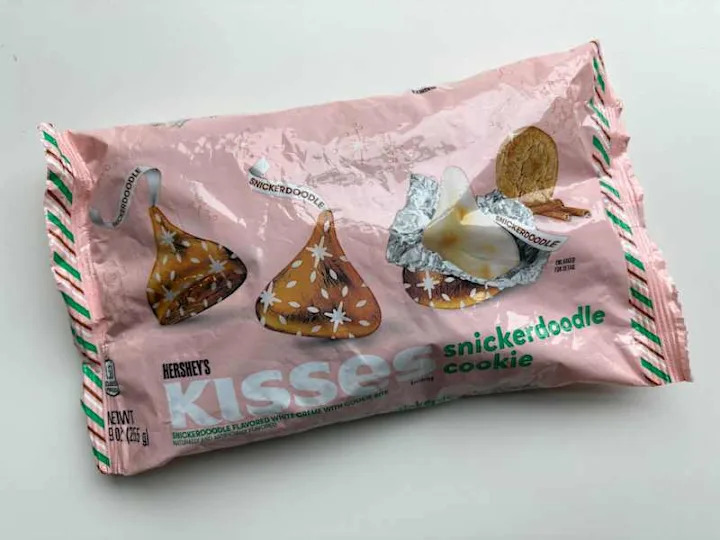 Bag of Hershey's kisses on tabletop.