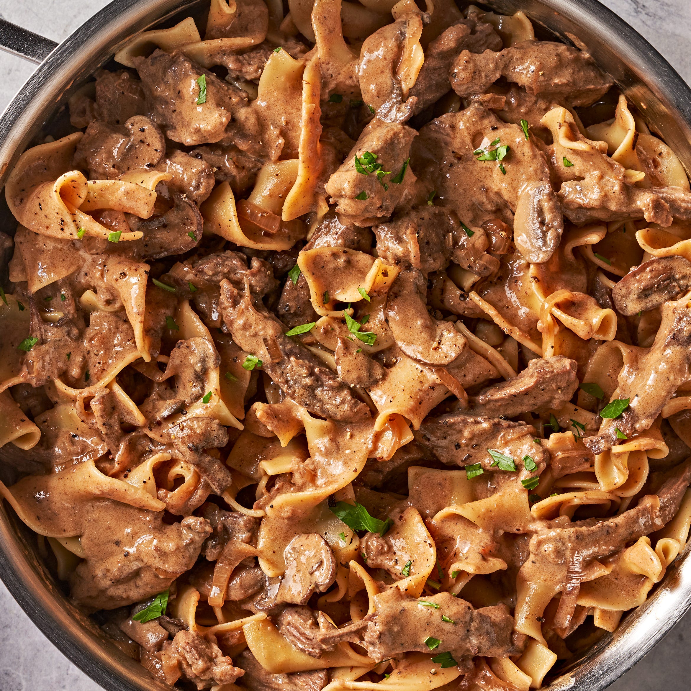 creamy beef and mushroom mixture with egg noodles