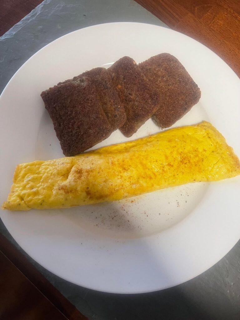 Breakfast is MidAtlantic AF. Scrapple & dusted the cheesy eggs with Old Bay lol