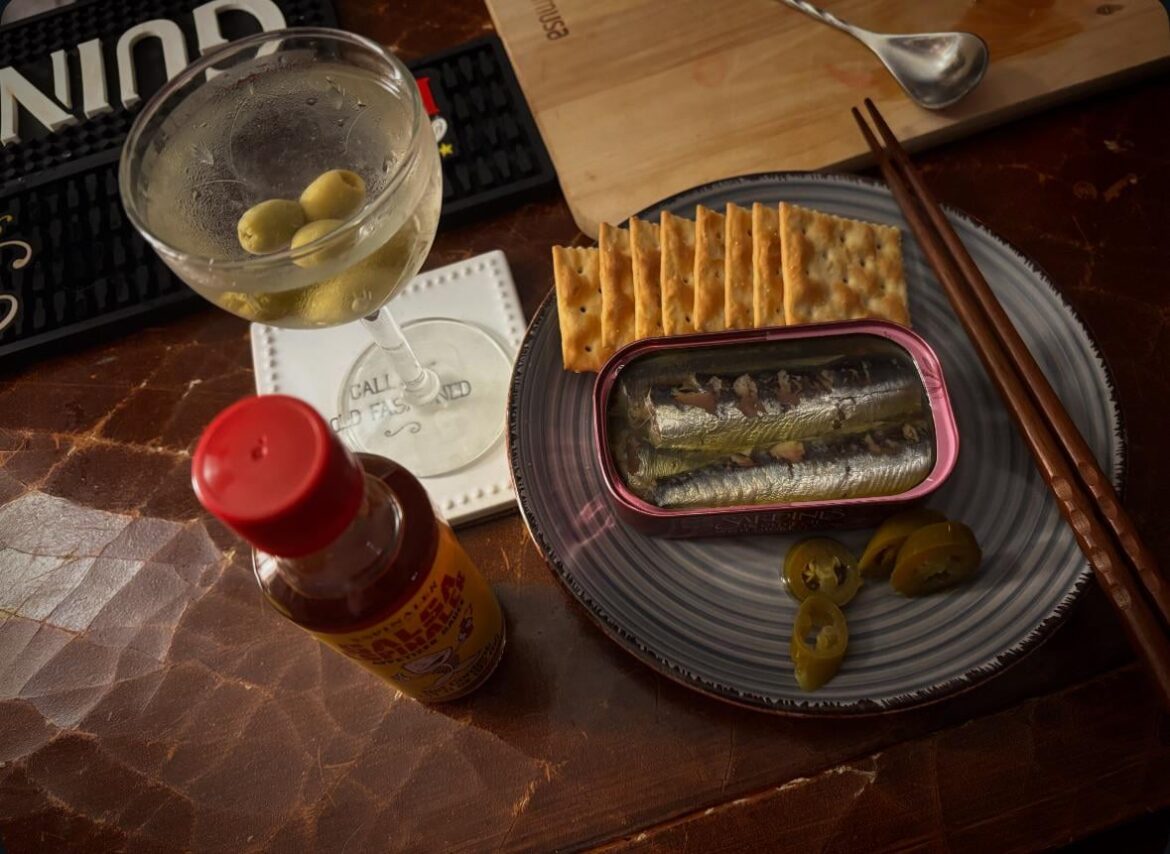 Trader Joe’s sardines in olive oil with smoke flavor, martini also.