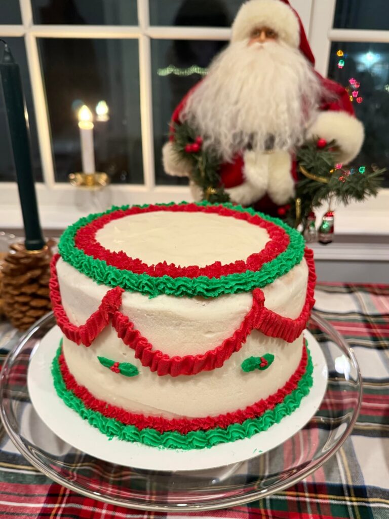 My first cake! Happy with how it turned out but hard to get the frosting consistency right.