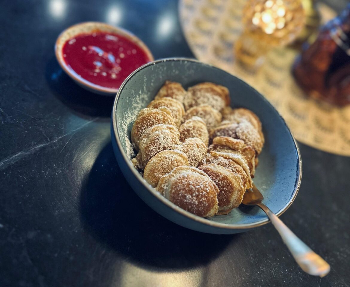 Gingerbread flavoured mini pancakes with raspberry jam