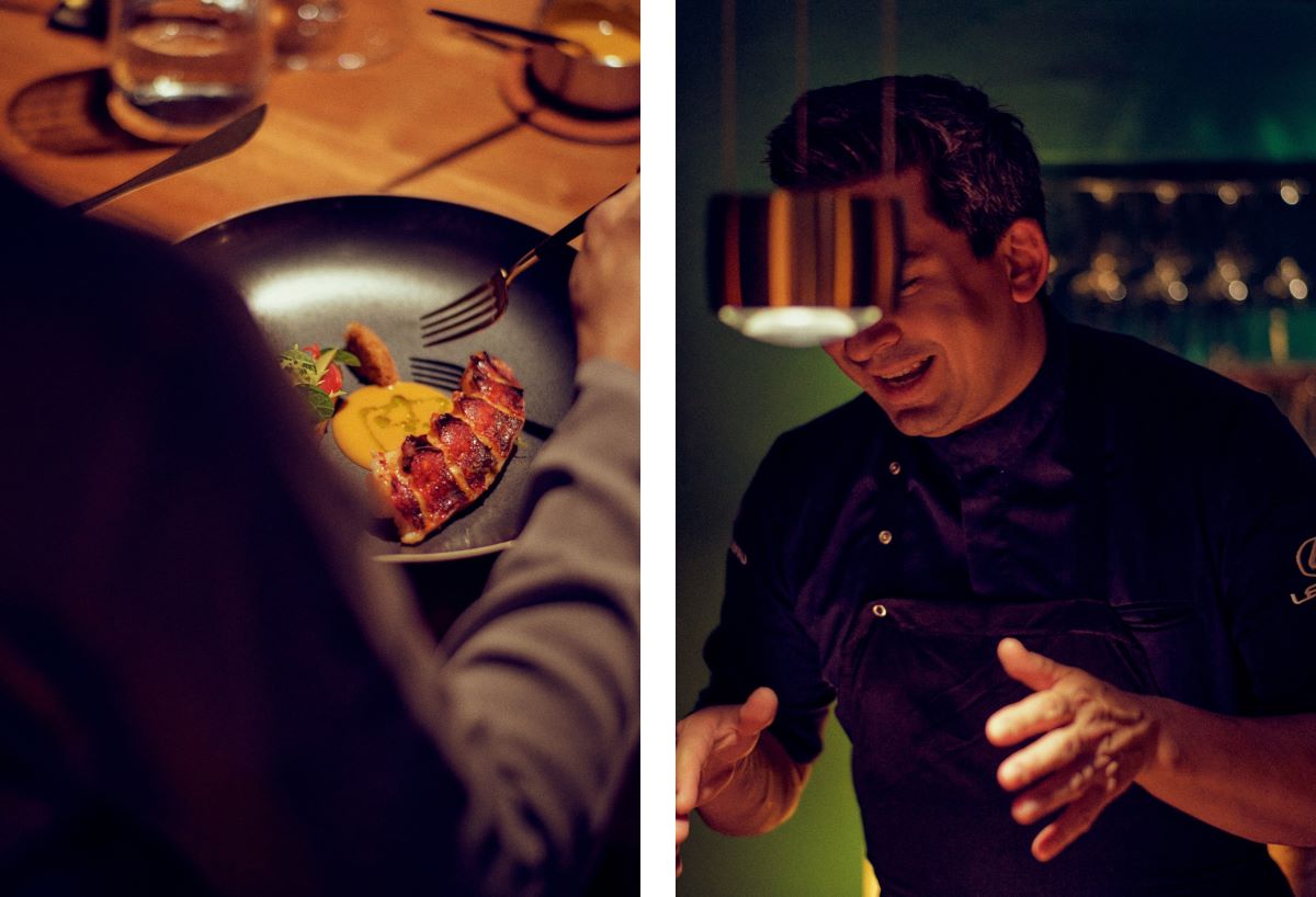 Breton lobster with green olives, shiso and romesco, alongside Tohru Nakamura presenting the dish to a guest. © Wim Jansen/The MICHELIN Guide