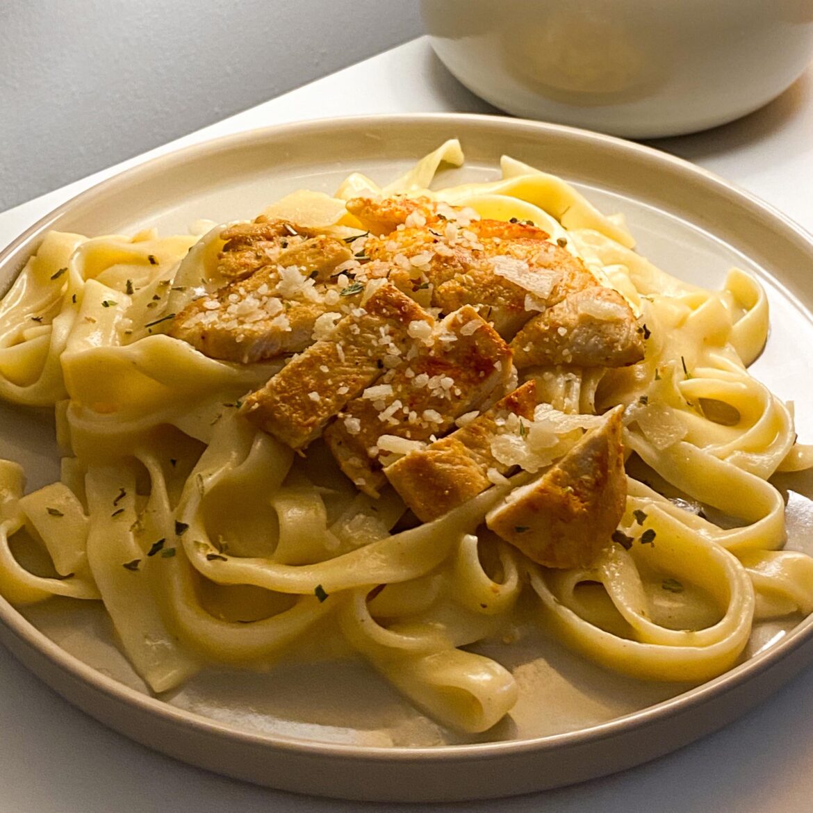 Creamy cheese tagliatelle with chicken and parmesan