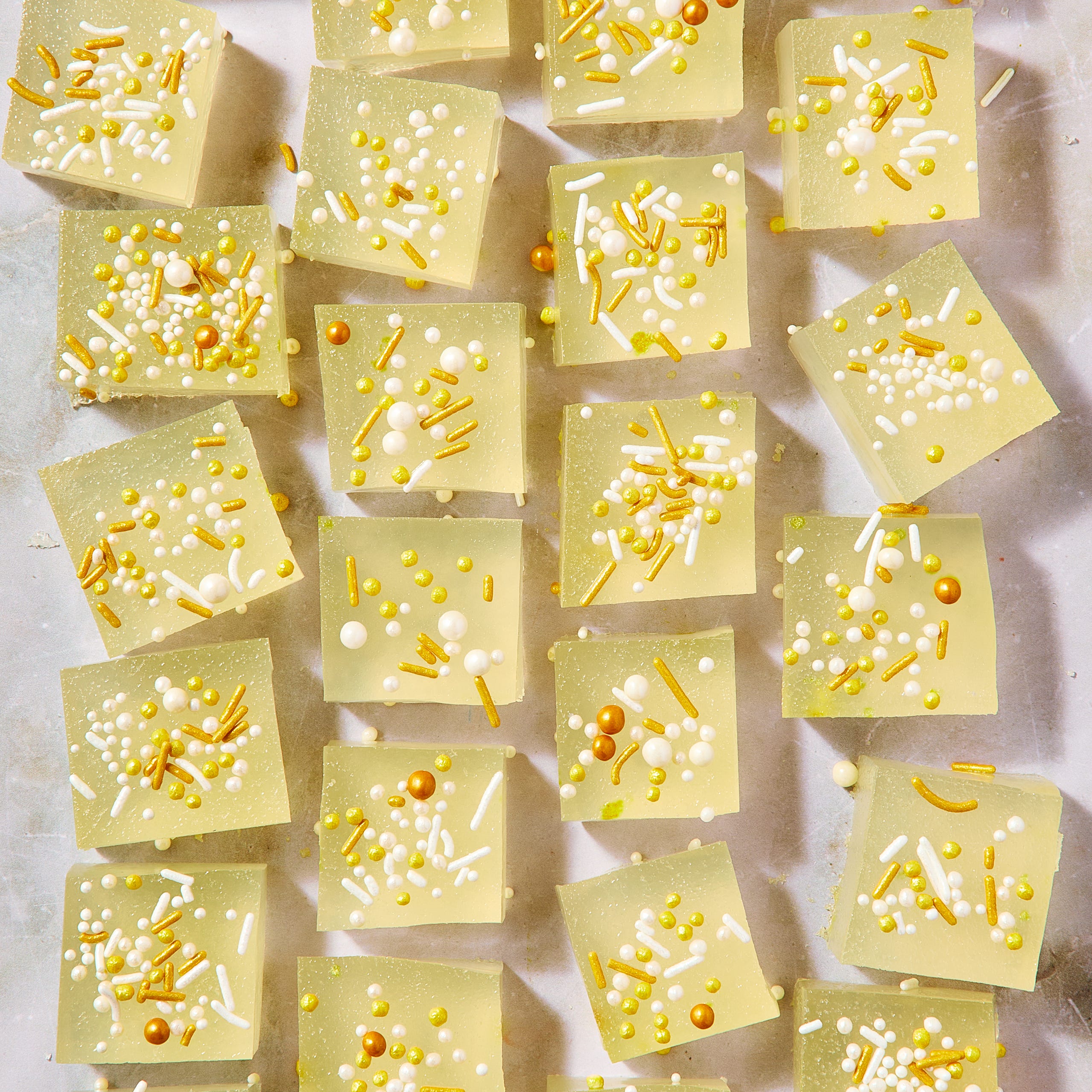 champagne jello shots decorated with sprinkles