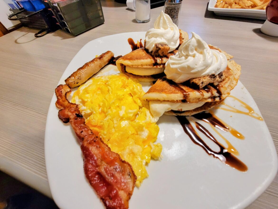 Cheesecake stuffed pancakes with cheesy eggs. Sometimes mixing dessert with breakfast isn't a bad thing.