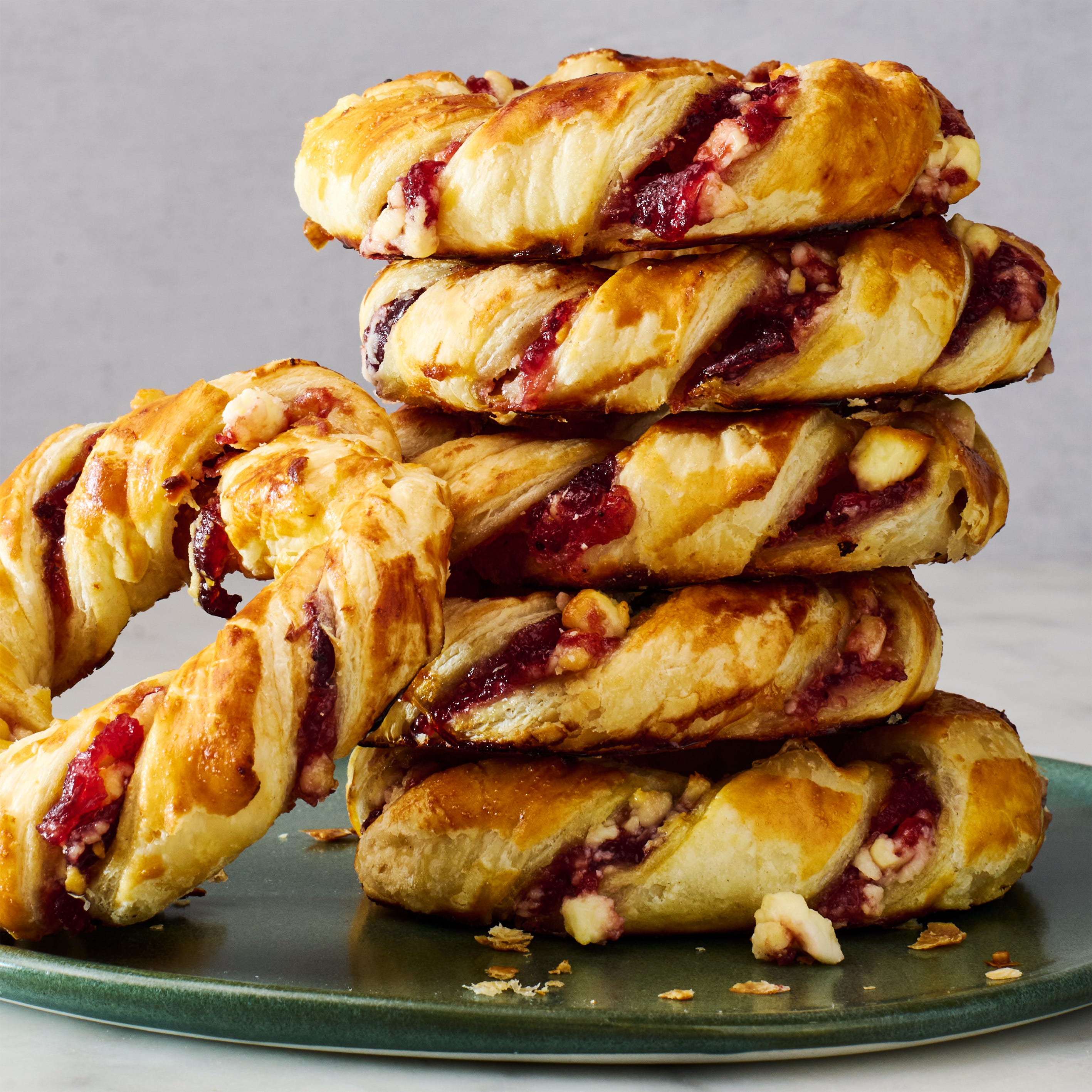 puff pastry filled with cranberry and feta shaped into wreaths