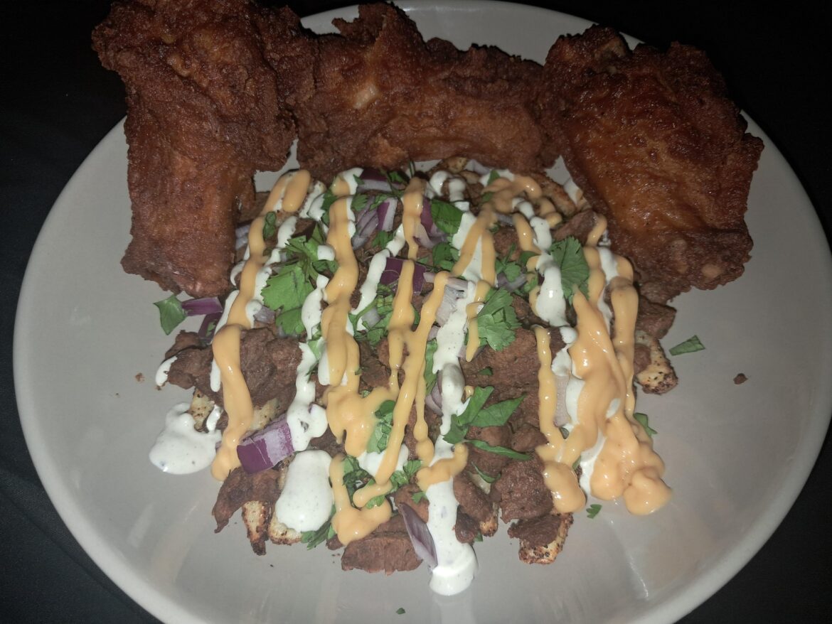 Carne asada fries and leftover wings