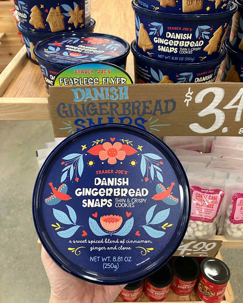 Someone holding Trader Joe's Danish Gingerbread Snap cookies.