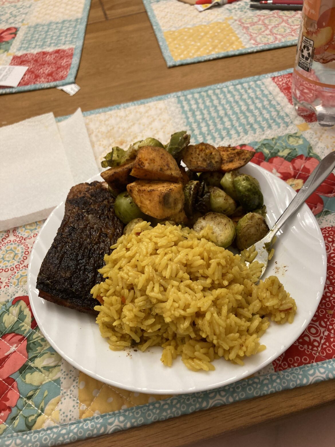 Salmon with sweet potato Brussels sprouts and yellow rice