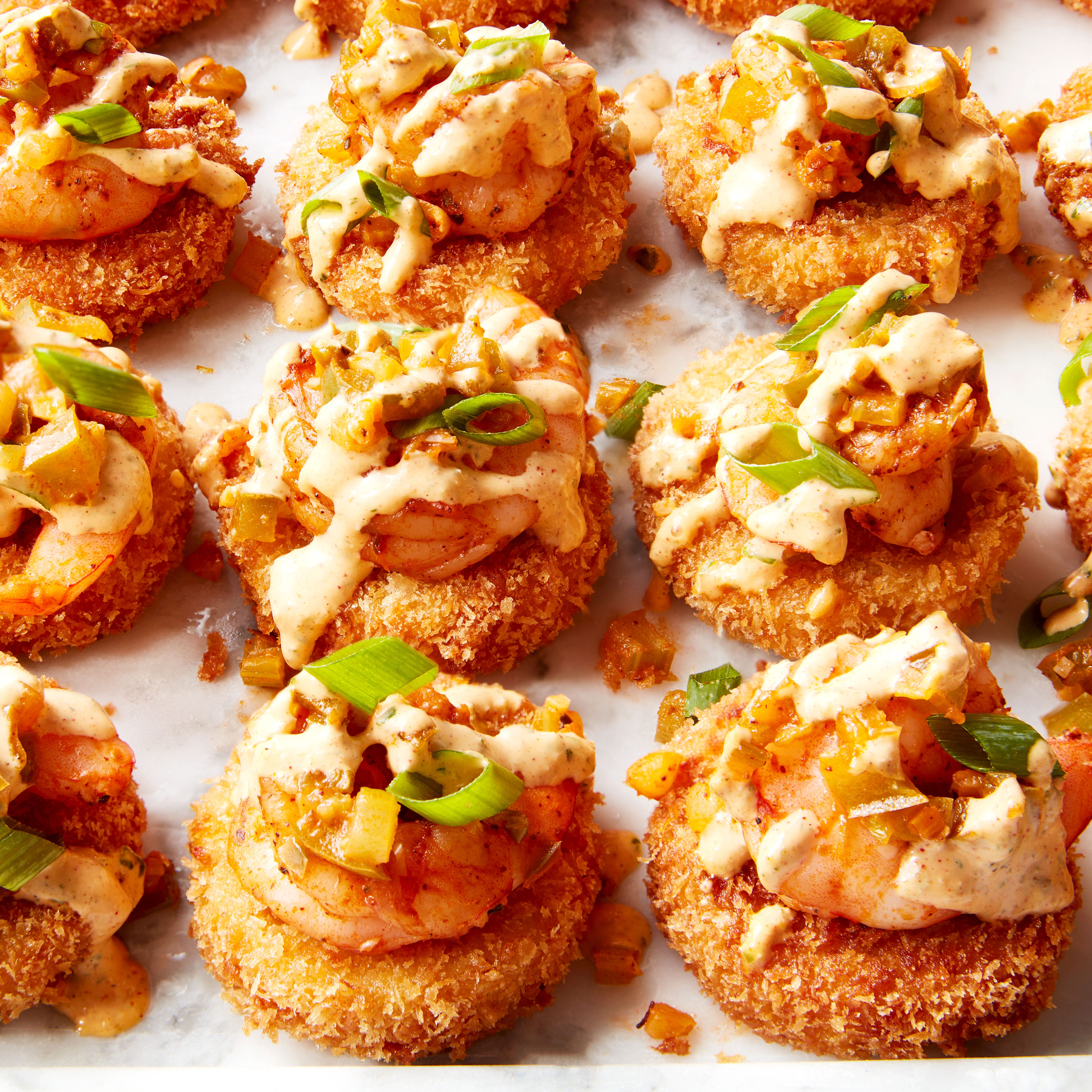 smoked gouda grits, breaded and fried until crispy then topped with cajun seasoned shrimp and creamy remoulade sauce