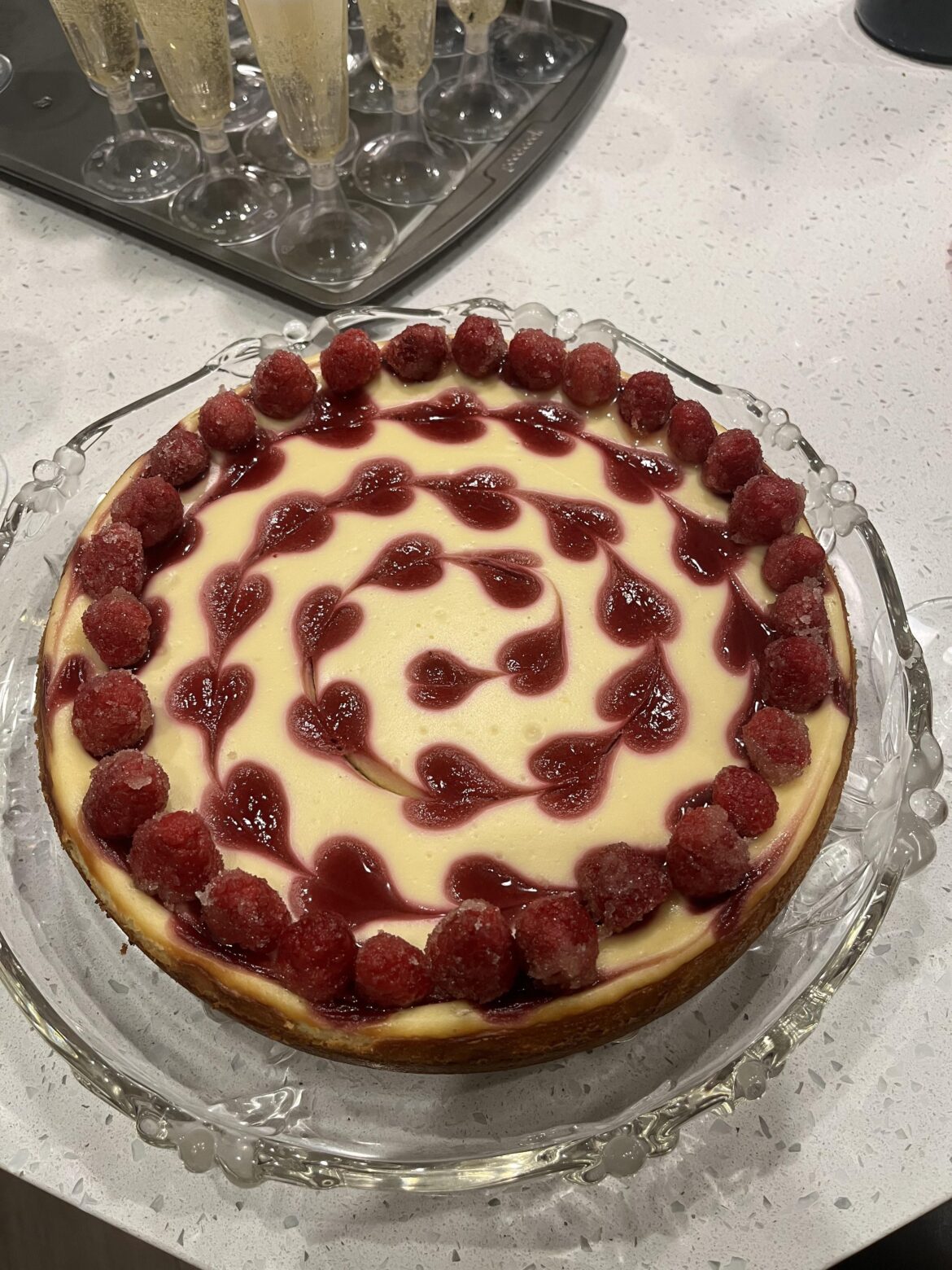 I made a raspberry cheesecake for my intimate Christmas wedding :)