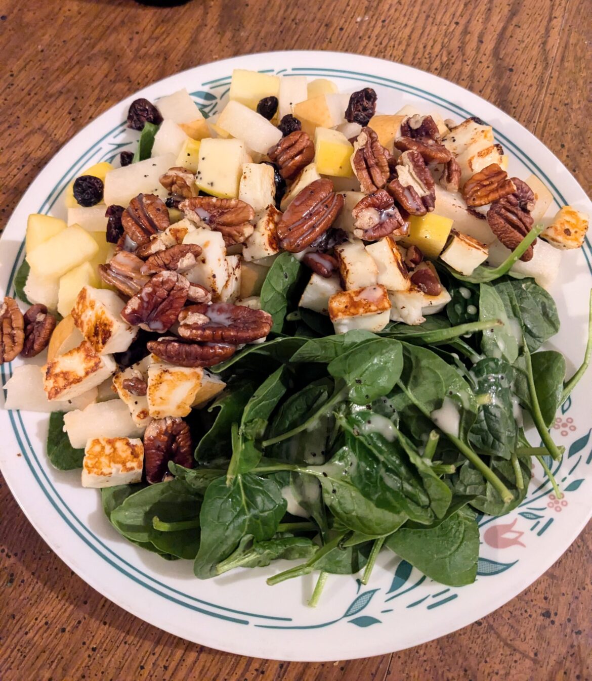Needed a light dinner after all the holiday leftovers. Spinach salad with apple, pear, cranberries, pecans, haloumi, and lemon-poppyseed dressing.