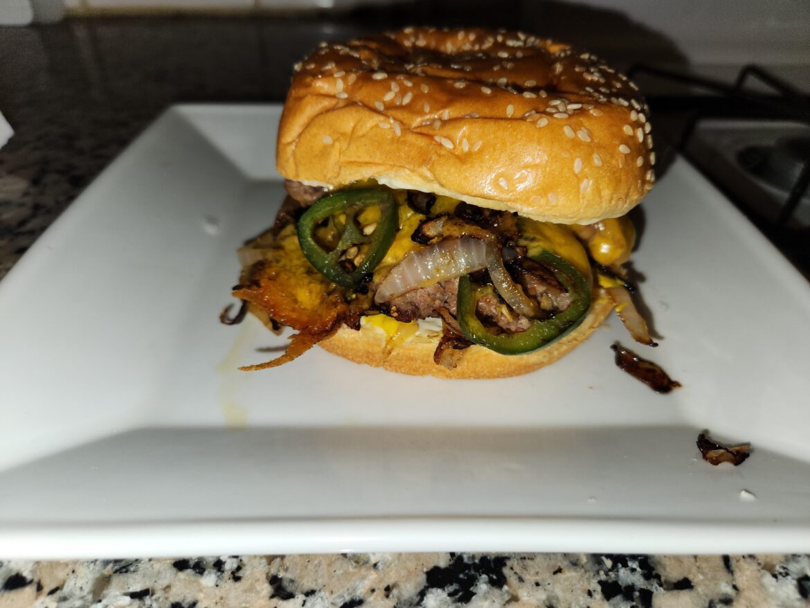 Smash onion, jalapeño burger w Duke's, mustard and seasonings
