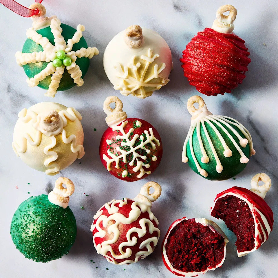 cake balls covered in icing and shaped like ornaments