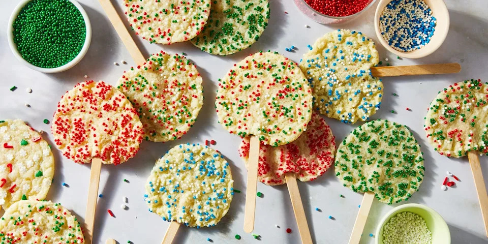 sugar cookies with sprinkles on sticks