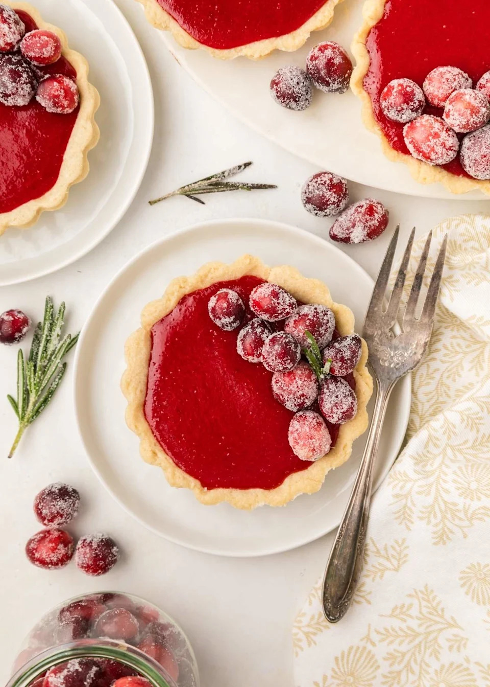 Cranberry tartlets on a plate.