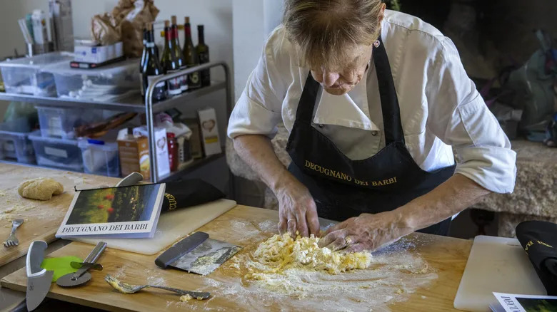 older Italian chef teaches pasta class