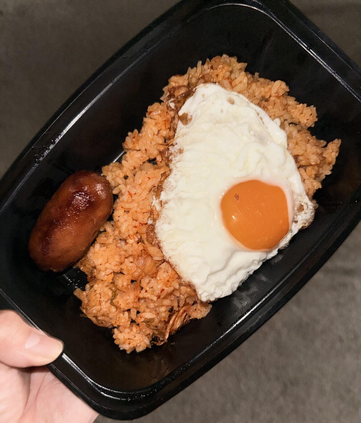 Put an egg on sausage and kimchi fried rice!