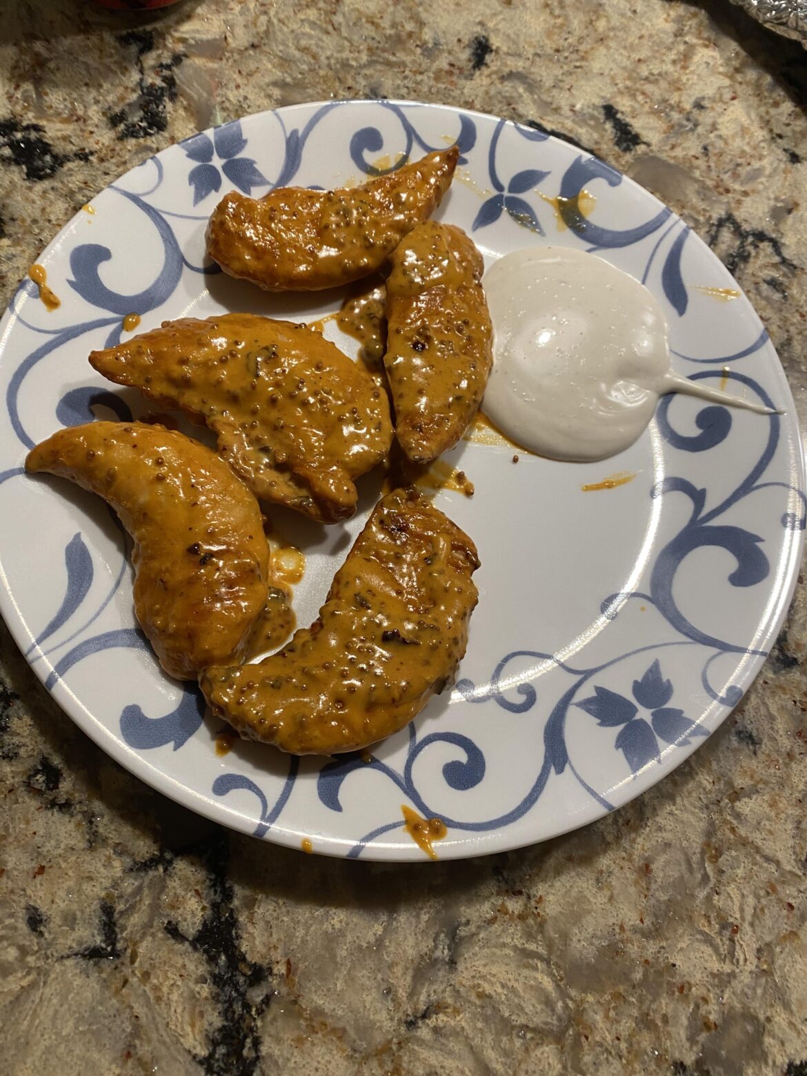 Air fried chicken tenderloin tossed in a sauce made from ranch, wing sauce, stoneground mustard, homemade hot sauce from my dad’s coworker, and salt. (With ranch on the side
