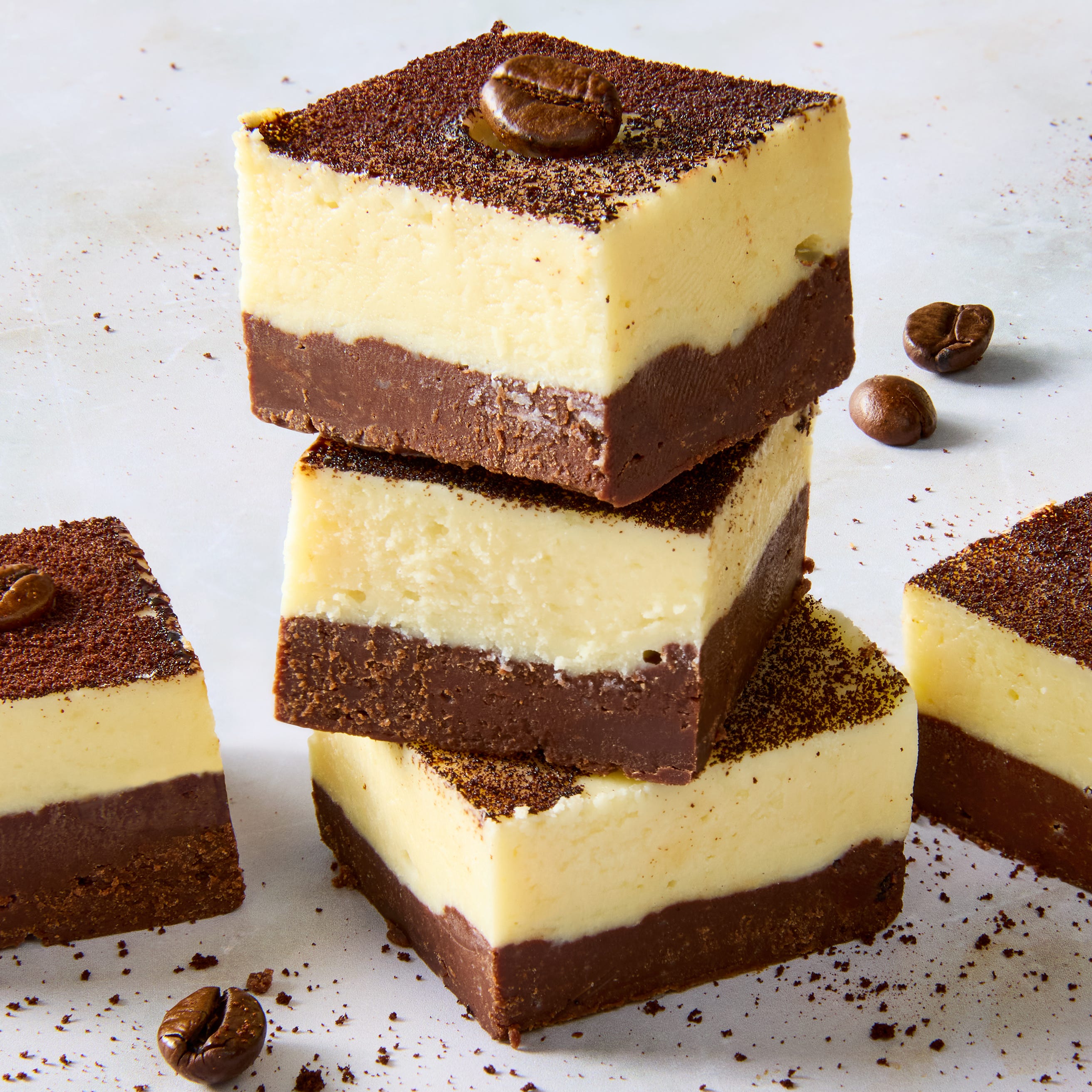 fudge topped with espresso powder and coffee beans