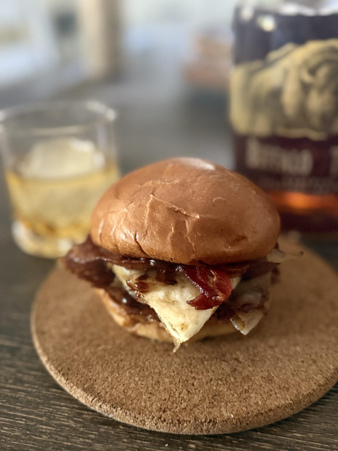 Bacon, grilled onions, egg, bbq sauce, cheese skirt.