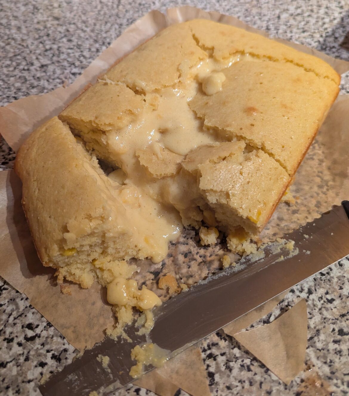 Fork test on corn bread came back clean. Removing it from the pan revealed a massive pocket of raw batter I somehow missed