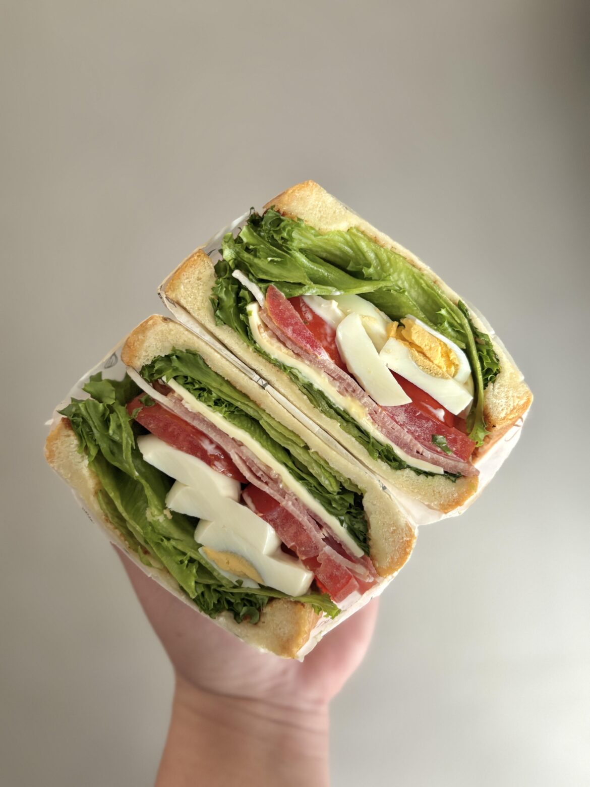 Ham, egg & cheese with lettuce, tomato & mayo — simple, but does the job well