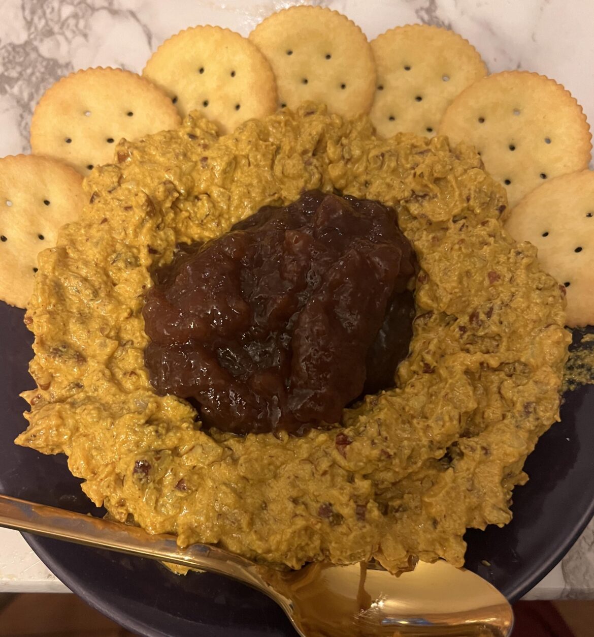 I made a cheese ring with strawberry preserves. Anyone else here grow up eating this very southern festive appetizer?