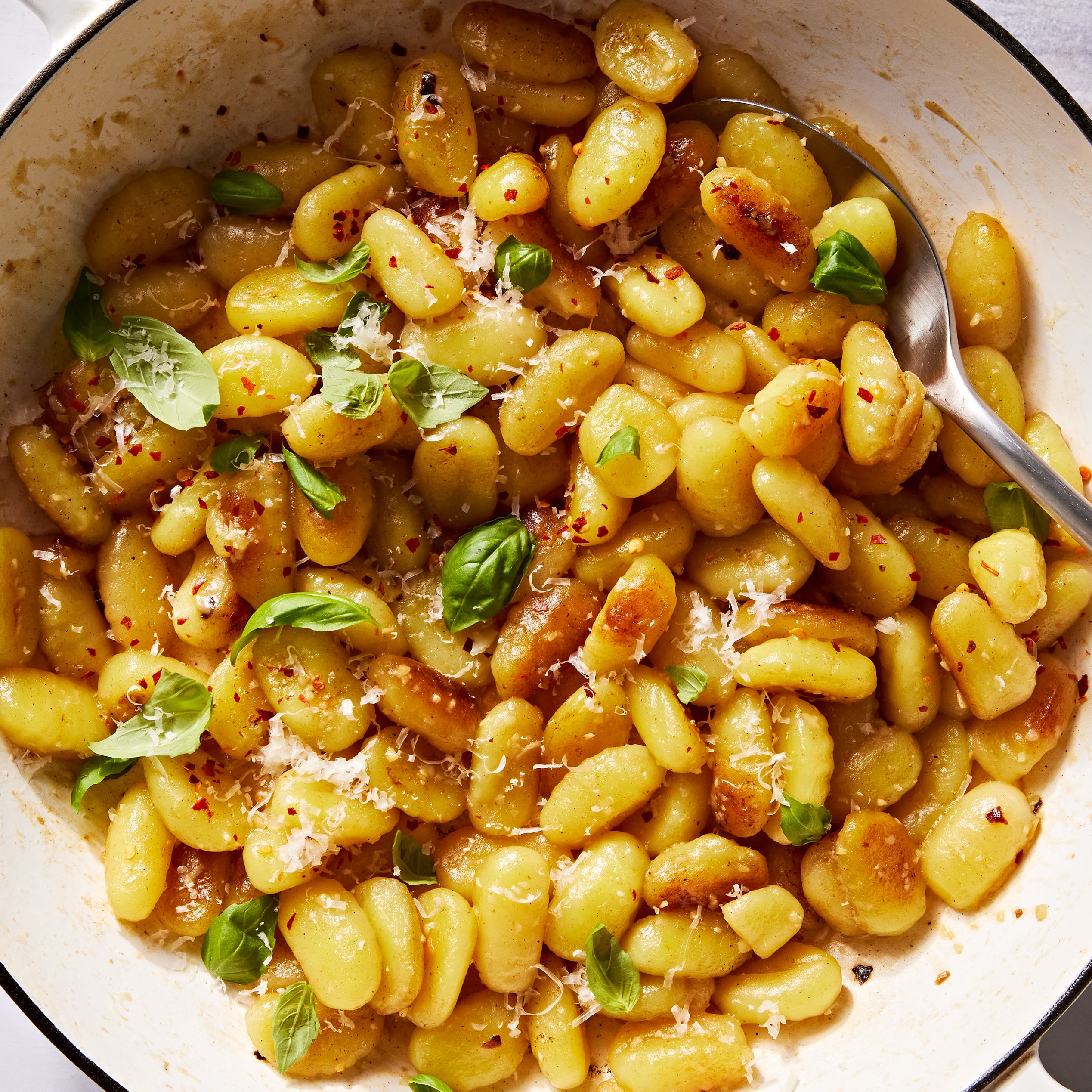 garlic parm gnocchi with red pepper flakes and basil