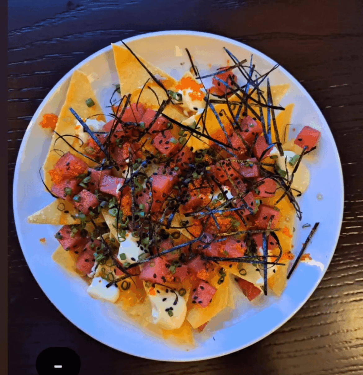 For lighter nachos, deep fry wontons. And with an asian twist: bluefin tuna, nori, tobiko, fior di latte, little kumquat and sesame