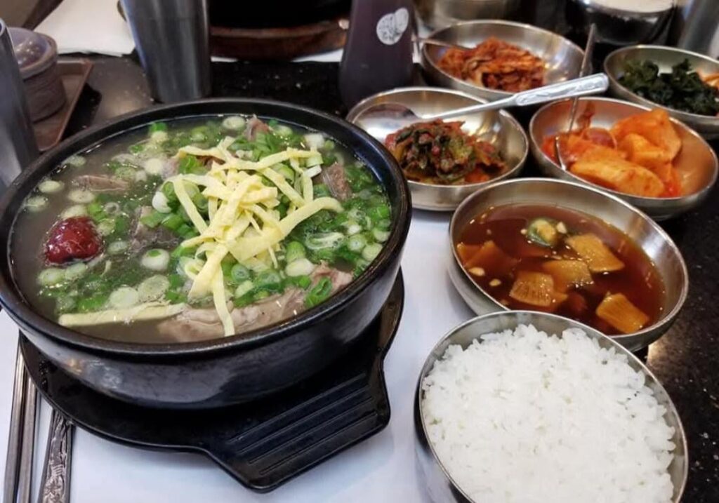Short rib soup, rice, and all the side dishes