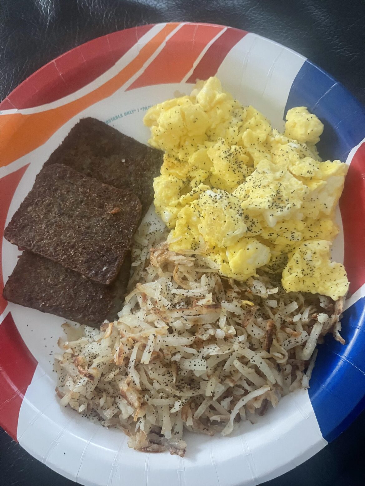 Eggs scrambled with hash browns & scrapple yum 😋