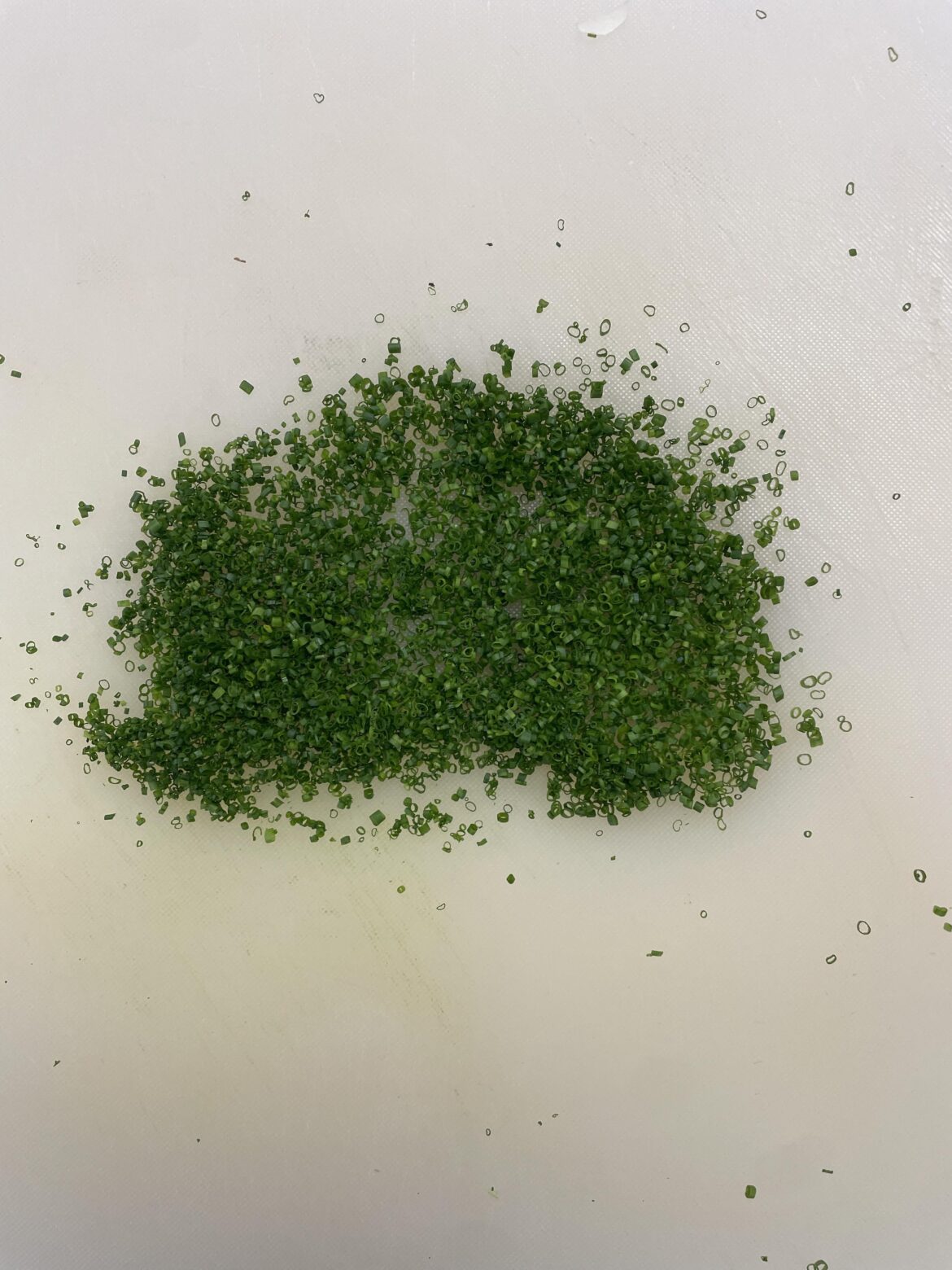 Cutting a couple of chives almost everyday until this Reddit says they’re perfect. Day 54