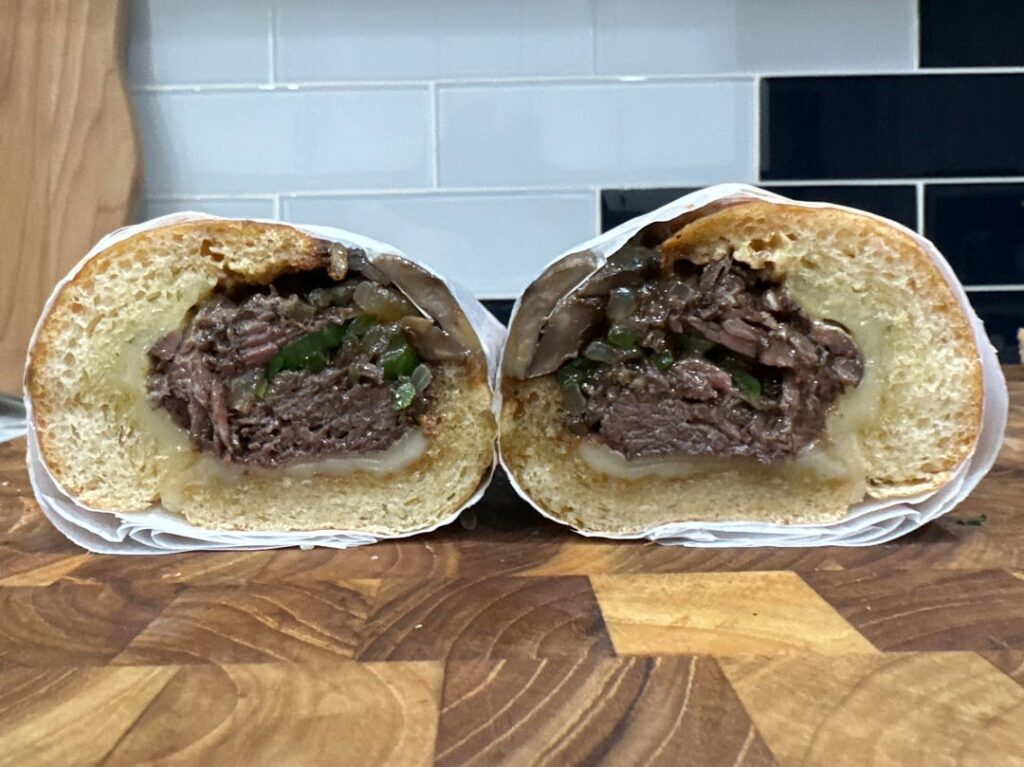 it’s 11:10pm and this is leftover beef burgundy on garlic.