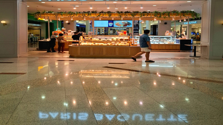 Signage for a Paris Baguette store in a mall