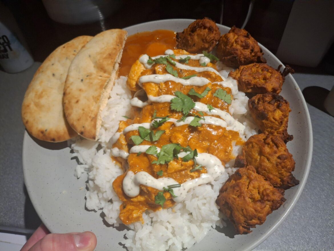 Butter chicken and homemade onion bhajis. Put far too much chillies in the bhajis !