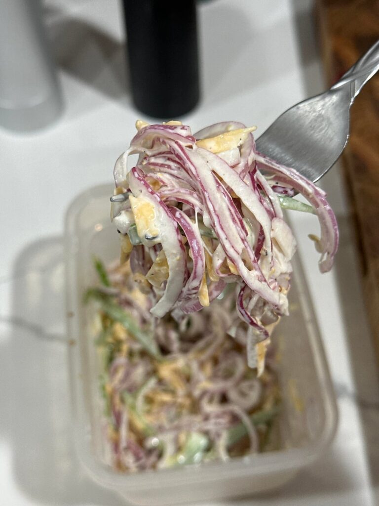 i just made this onion slaw but i feel like it needs something. it’s going to be going on a sandwich.