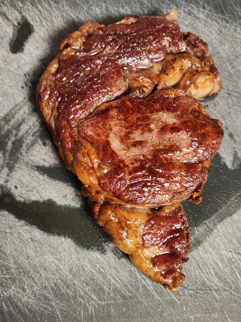 Ribeye in the bath for 90 min at 130, then seared 60s/side in smoking hot cast iron.