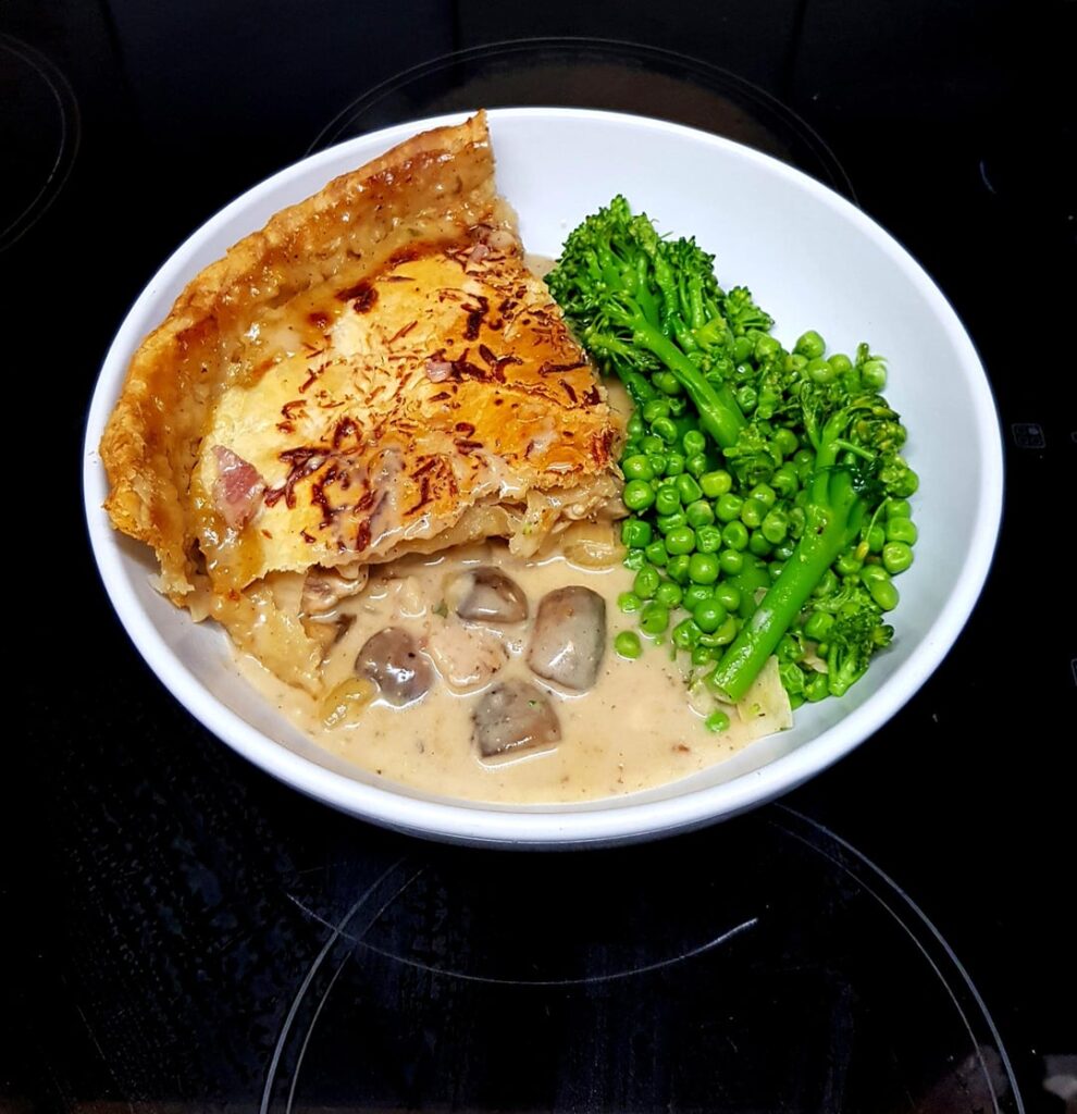 Chicken, Bacon and Mushroom Suet Pastry Pie with Brie and White Wine Sauce. Sautéed Tenderstem Brocolli and Peas.