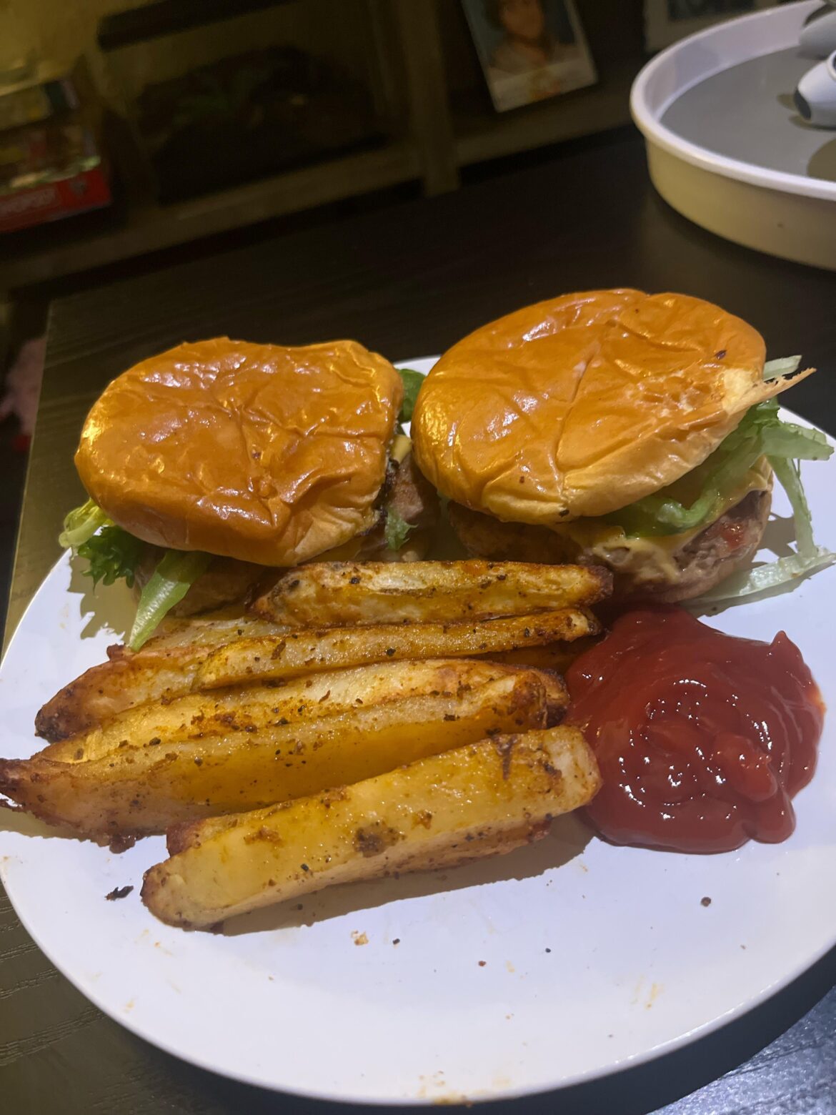 My girlfriend made turkey burgers with homemade fries for Christmas Eve dinner
