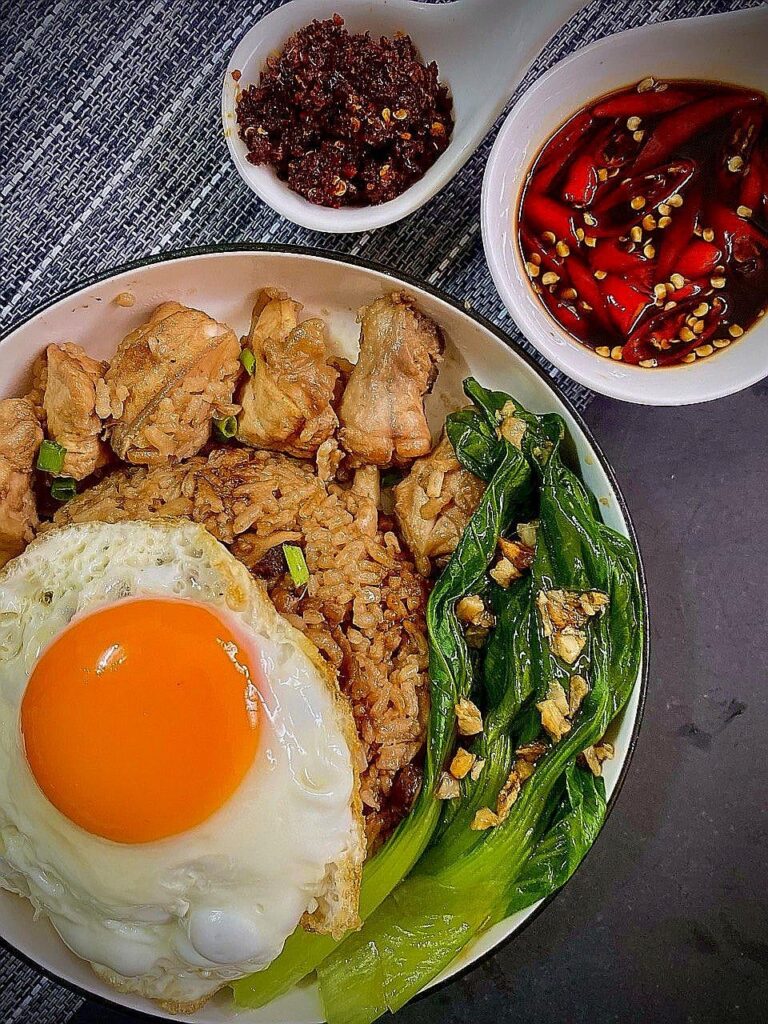 Rice Cooker Claypot Chicken Rice with Steam Pakchoy, Sunny Side up and Chilli Oil.