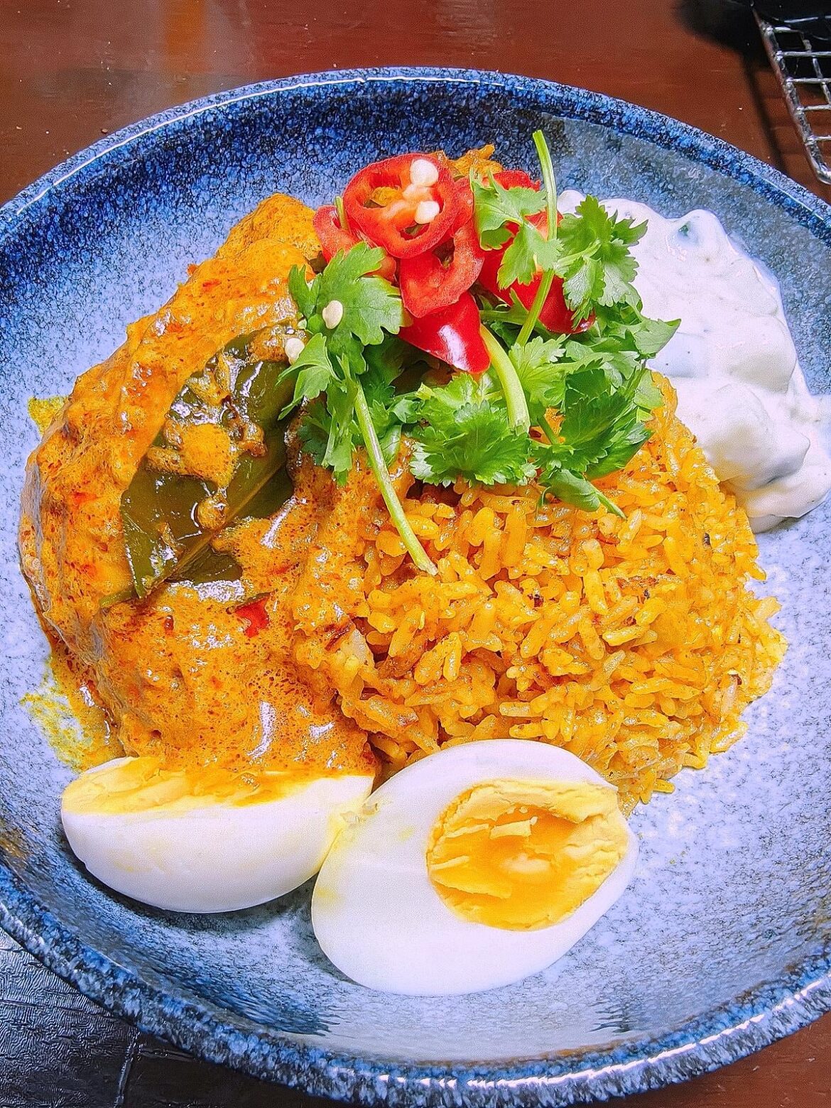 I don't know what to call this yet. Spicy chicken and coconut rice, served with cucumber yogurt sauce? Read my description and help me with a name for the recipe please? 🙏🏻♥️🤤