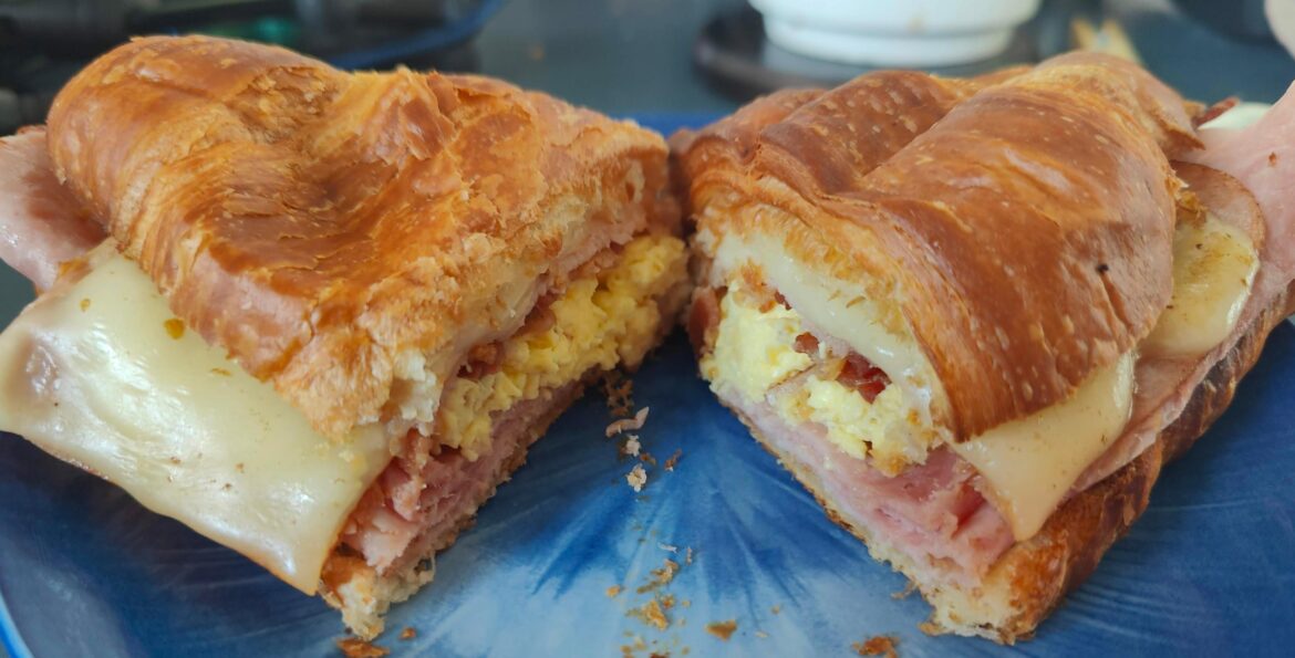 Costco Croissant with eggs, cheese, ham, and bacon