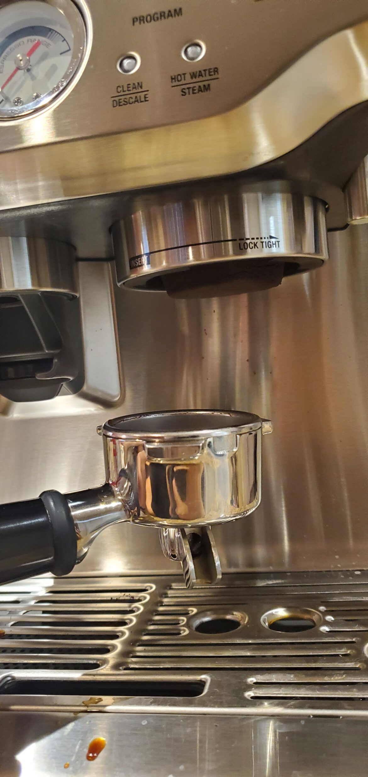 Why is puck sticking? [Breville Espresso Express]