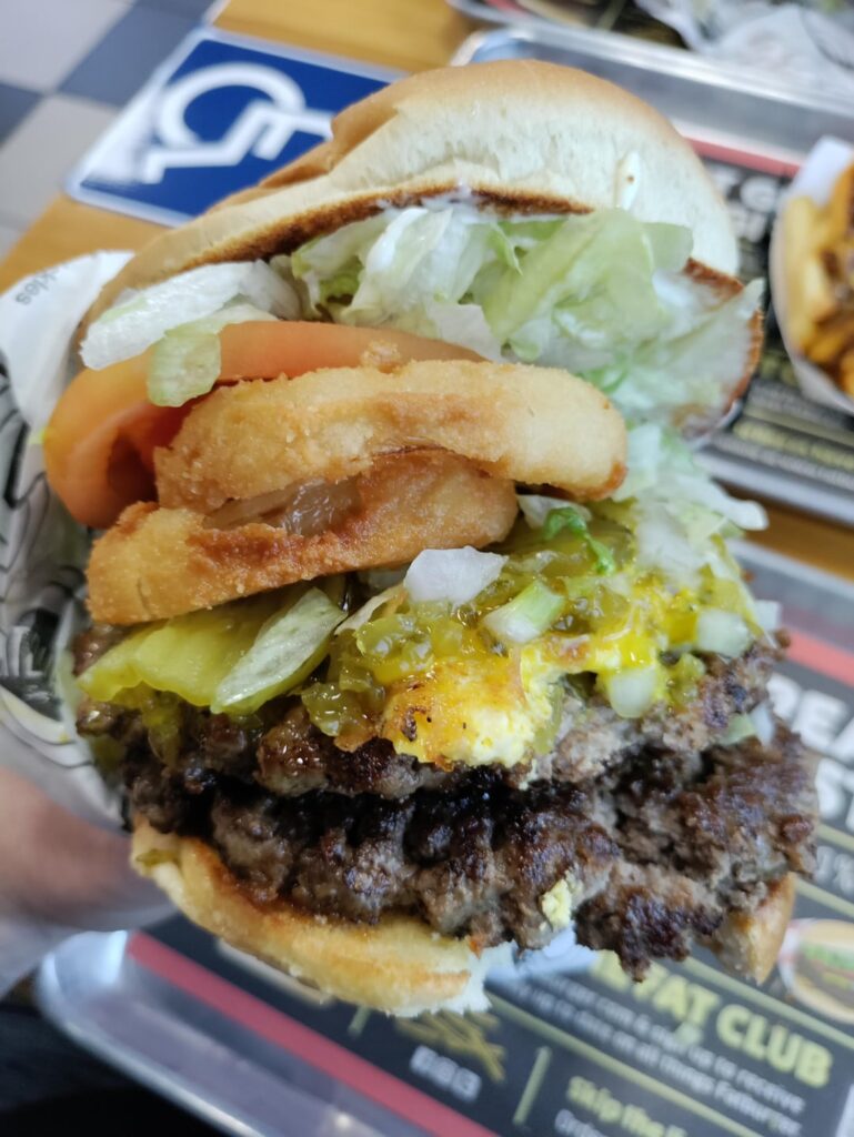 The XXL from Fat burger, with all the works. Plus an egg and onion rings. It was a beast but absolutely delicious.