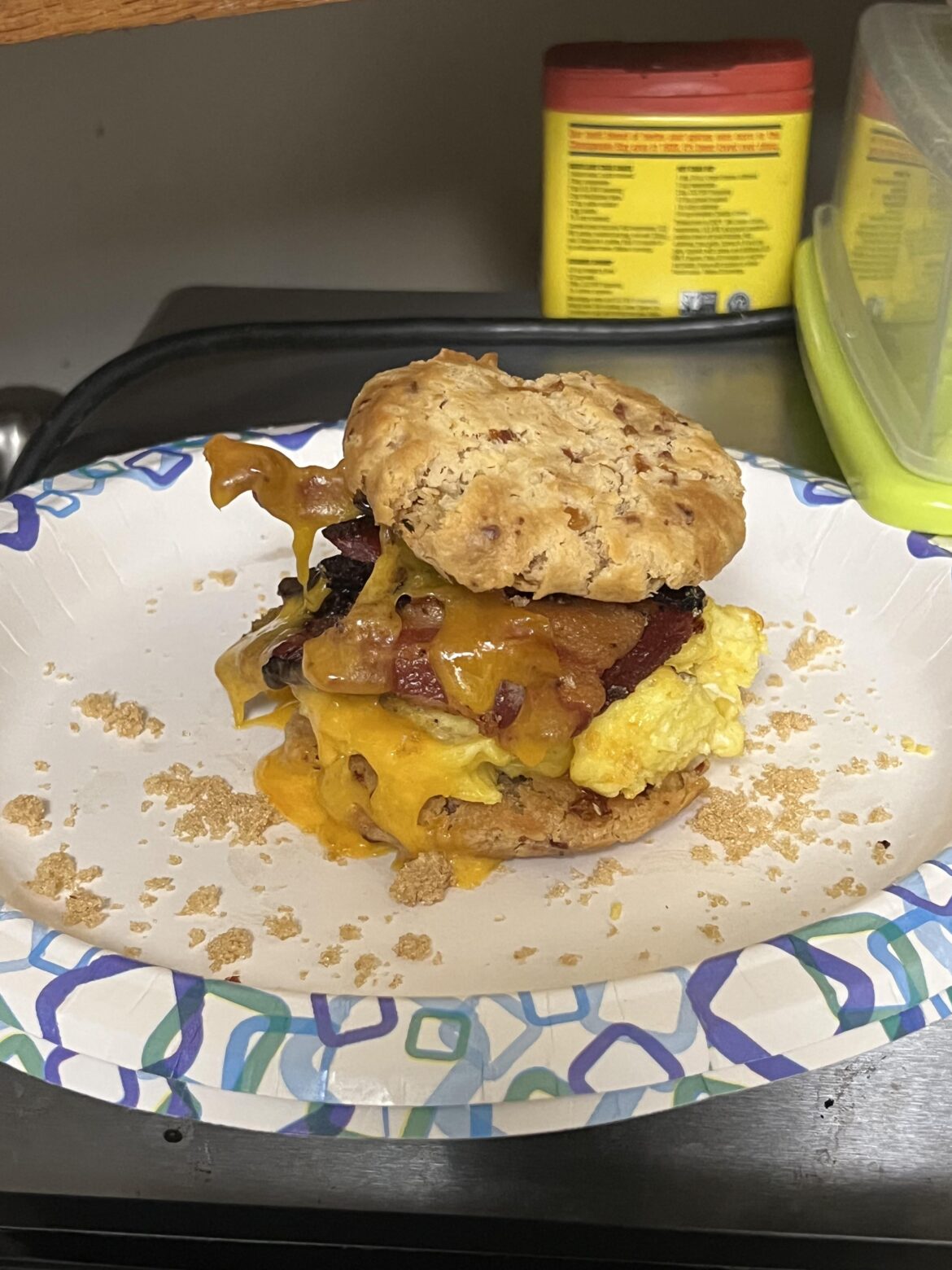 I'm very high. Cheddar eggs and brown sugar candied bacon with a slice of cheddar on two red lobster cheddar bay biscuits, dusted with brown sugar for garnish