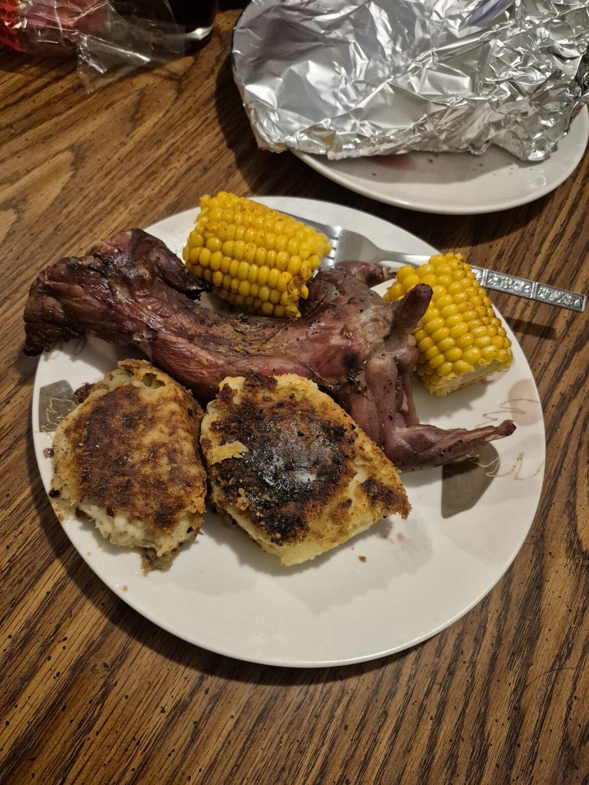 Squirrel with mashed potato cakes